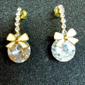 Bow tie and rhinestone earring